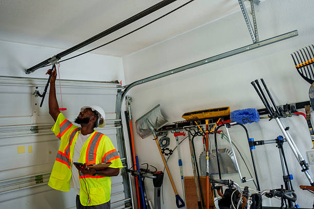 Professional Garage Door Installation technician working in West Elmira, NY
